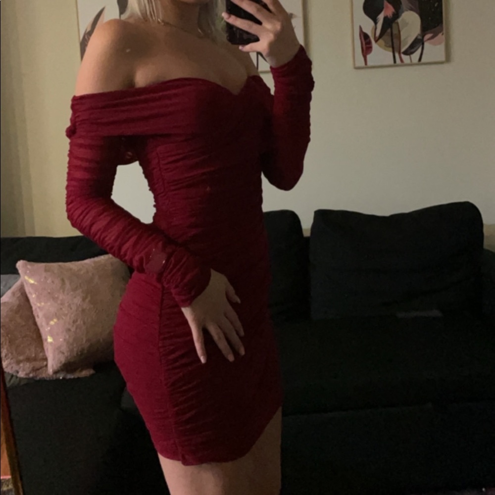 Beautiful red off the shoulder dress with form flattering ruching
